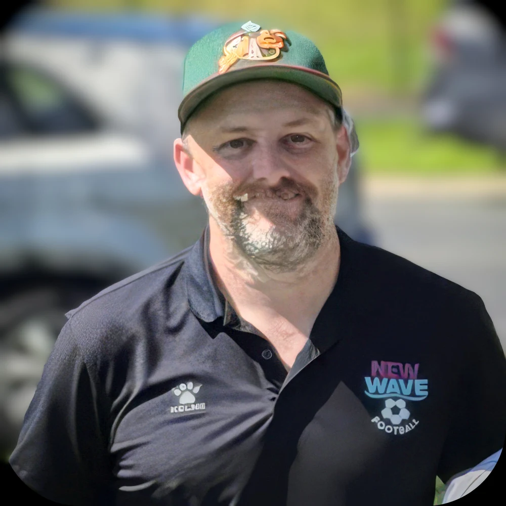 Coach Liam Banagan in a New Wave Football polo