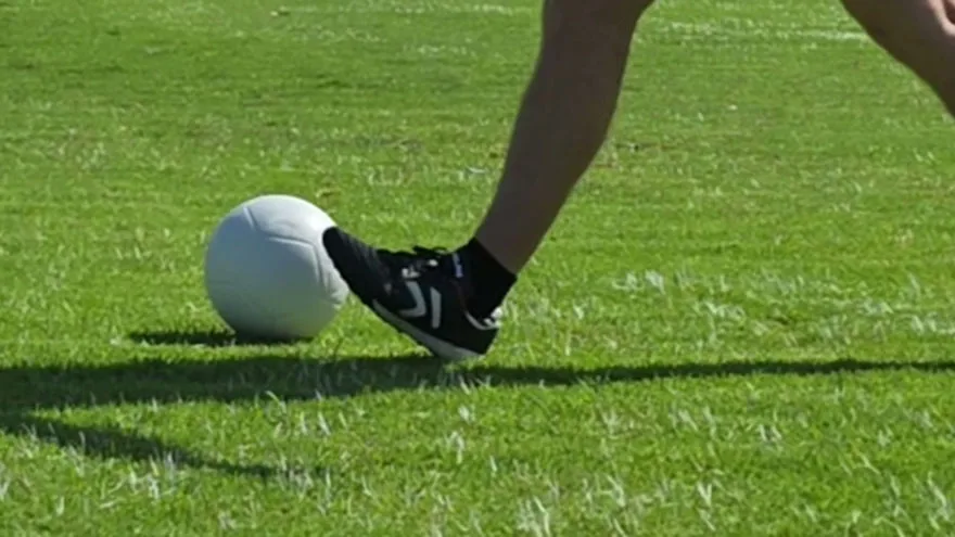 Side View Slow-Mo: Where to plant the foot for balance and stability when striking the ball.